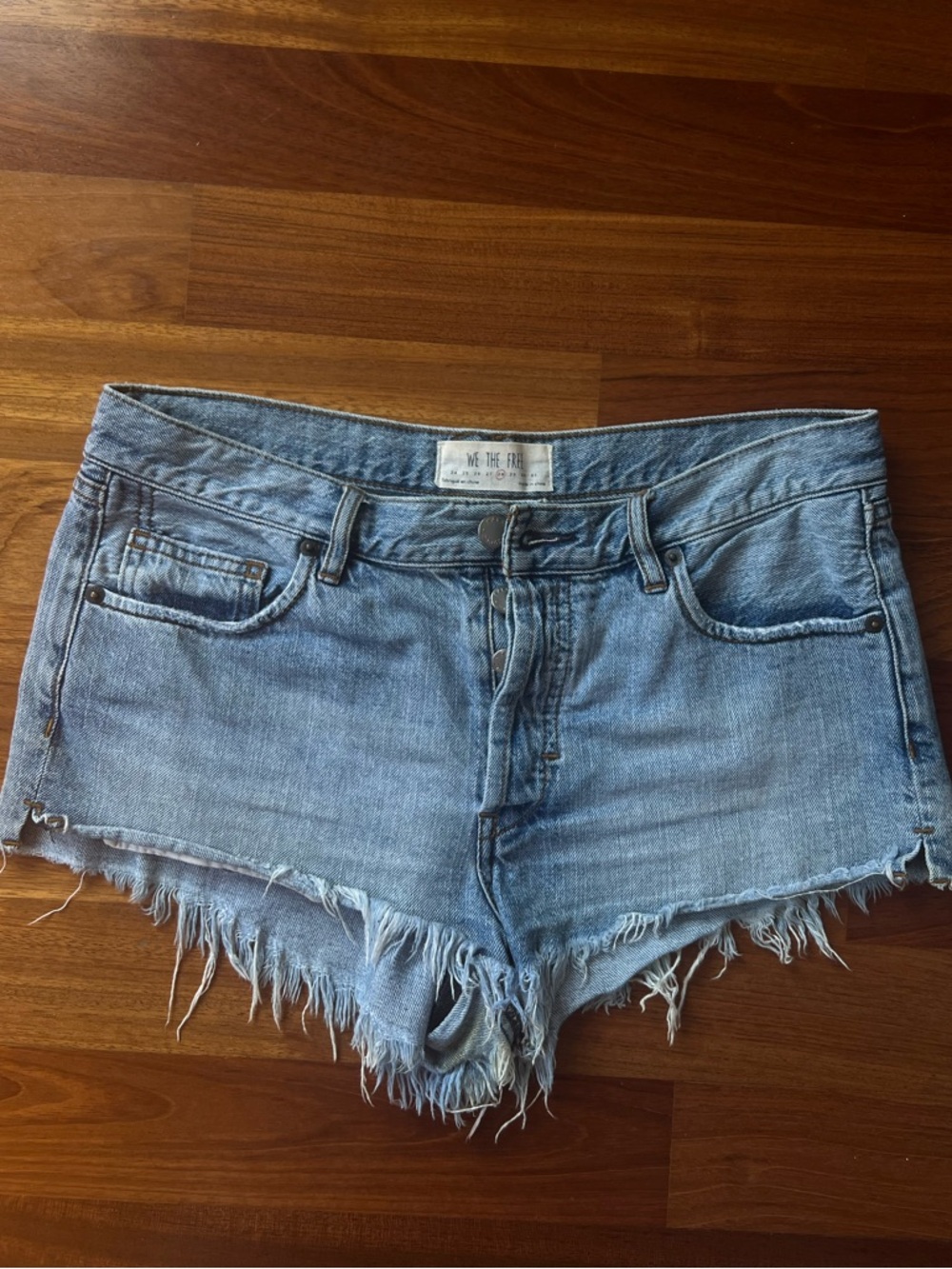 We The Free Light Blue Distressed Denim Cutoff Shorts